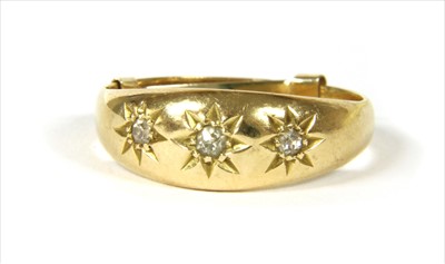 Lot 2 - An 18ct gold three stone diamond ring