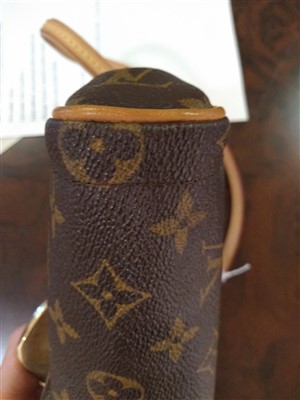 Lot 677 - A Louis Vuitton monogrammed 'Beverly' Clutch