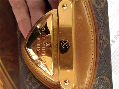 Lot 677 - A Louis Vuitton monogrammed 'Beverly' Clutch