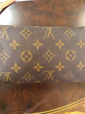 Lot 677 - A Louis Vuitton monogrammed 'Beverly' Clutch