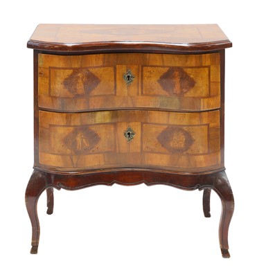 Lot 930 - A walnut petit commode