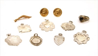 Lot 121 - A pair of 9ct gold 'Aquarius' cufflinks