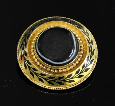 Lot 53 - A Victorian gold, banded agate, circular shield form brooch
