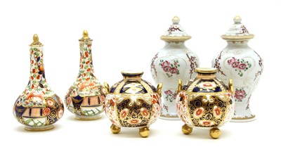 Lot 438 - A pair of Crown Derby squat form vases