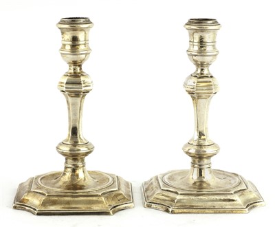 Lot 9 - A pair of George I Britannia standard silver candlesticks
