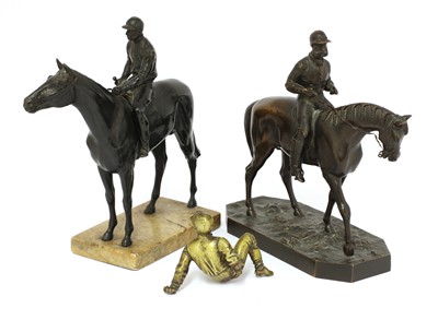 Lot 196 - An equestrian bronze group
