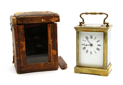 Lot 200 - A brass carriage clock