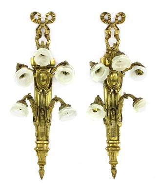 Lot 756 - A pair of Continental brass five-light wall lights