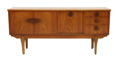 Lot 524 - A post-war teak sideboard