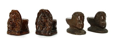 Lot 336 - A pair of George III saltglaze stonework figural window stops