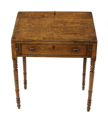 Lot 553 - A Victorian oak fall front desk