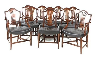 Lot 885 - A set of ten George III-style mahogany shield back dining chairs