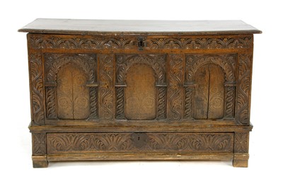 Lot 616 - An oak triple panelled coffer