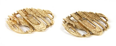 Lot 9 - A pair of matched 9ct gold pendants
