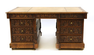 Lot 614 - An oak partners desk