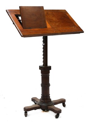 Lot 824 - A walnut reading stand