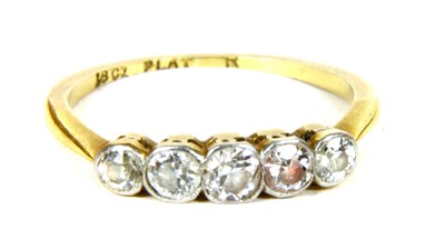 Lot 14 - A five stone diamond ring
