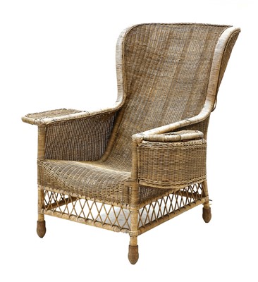 Lot 902 - A large wicker spoon back armchair