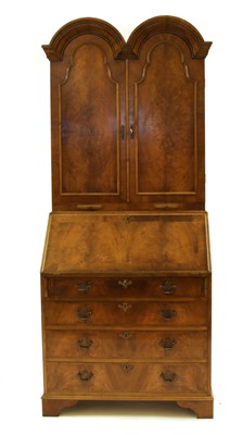 Lot 624 - Queen Anne style walnut double domed bureau bookcase