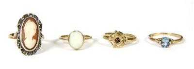 Lot 1043 - A 9ct gold opal ring