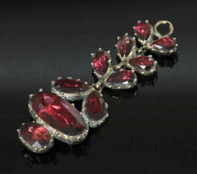 Lot 10 - A Georgian gold flat cut foil-backed garnet pendant drop