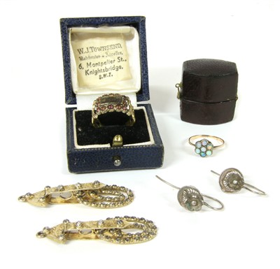 Lot 1033 - A 9ct gold and silver opal cluster ring