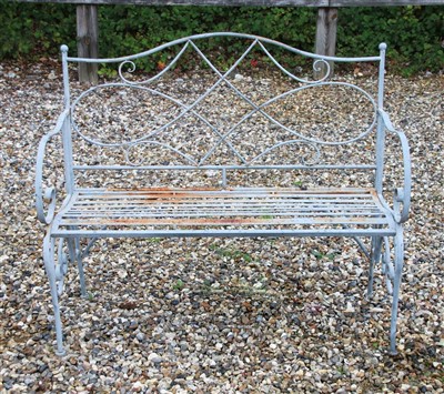 Lot 645 - A wrought iron painted garden bench