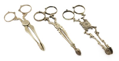 Lot 50 - A pair of silver sugar tongs
