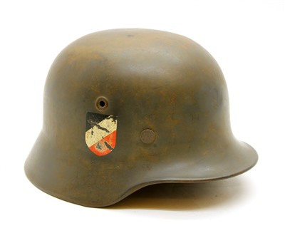 Lot 173 - A Dunkirk period German original Luftwaffe combat M35 rolled edge helmet with liner