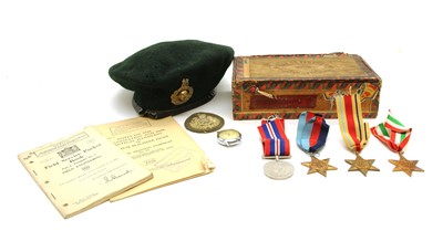 Lot 99 - A WWII British Royal Marines Commando green beret