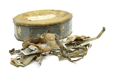 Lot 121 - A WWI British Zeppelin airship relics Home Front tin