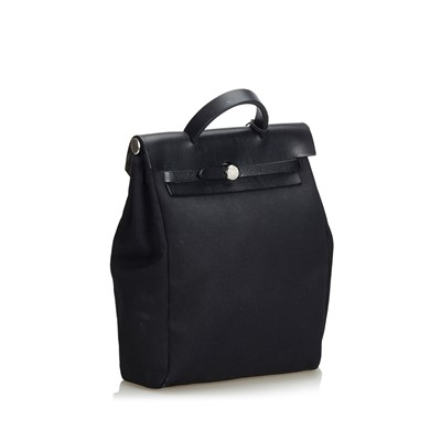 Lot 688 - An Hermès black canvas 'Herbag' backpack