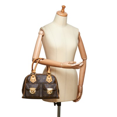 Lot 676 - A Louis Vuitton monogrammed Manhattan PM bag