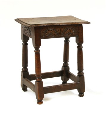 Lot 617 - An oak joined stool