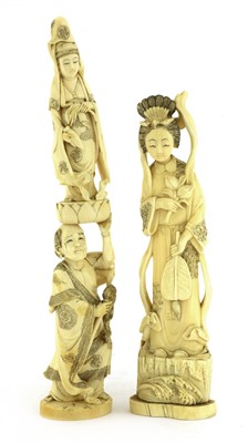 Lot 131 - Two Japanese carved ivory figure groups