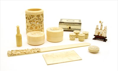Lot 232 - A box of early 20th century oriental carved ivory items