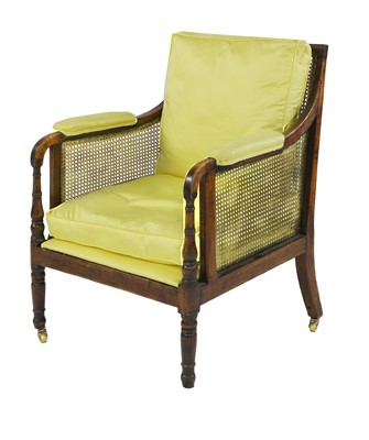 Lot 641 - A mahogany bergère library armchair