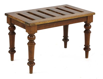 Lot 613 - A walnut luggage stand