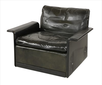 Lot 612 - A 'Model 620' chair and footstool