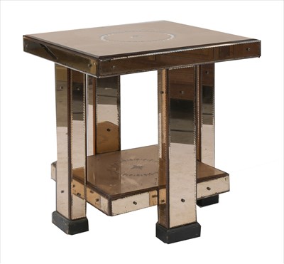 Lot 321 - A peach mirrored glass side table