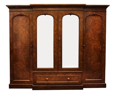 Lot 588 - An early 20th century burr walnut breakfront wardrobe