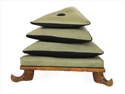 Lot 176 - A triangular 'Aladdin' footstool
