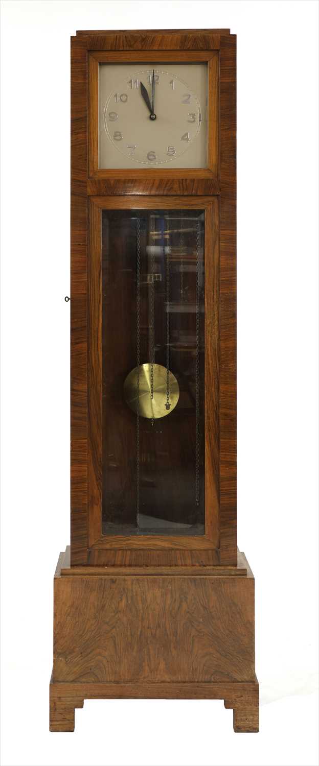 Lot 112 - An Art Deco walnut longcase clock