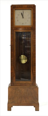 Lot 112 - An Art Deco walnut longcase clock