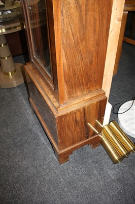 Lot 112 - An Art Deco walnut longcase clock