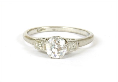 Lot 28 - A platinum three stone diamond ring