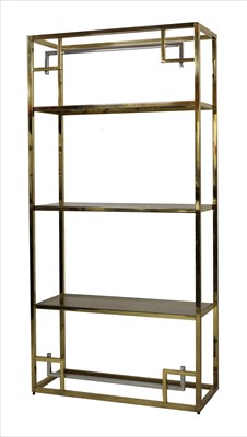 Lot 641 - A brass and chrome étagère