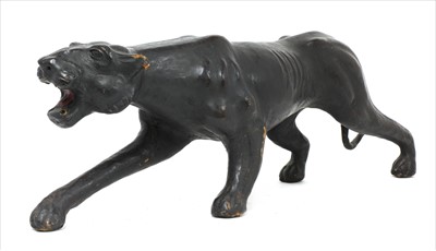 Lot 113 - A carved and painted leather figure