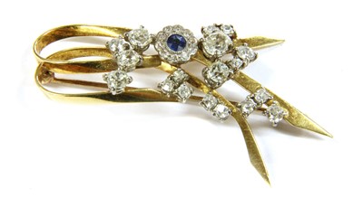 Lot 64 - A gold sapphire and diamond spray brooch