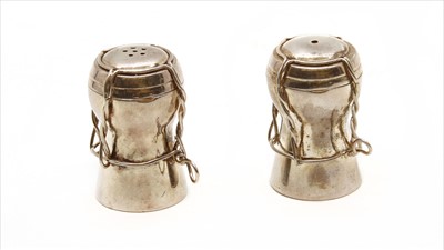 Lot 209 - A sterling silver two-piece novelty cruet set